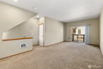 Living Room with Deck overlooking the back yard area.