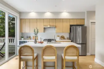 Stainless Steel Appliances Paired with a Powerful Direct Vent Hood