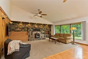 Wood burning stove surrounded by stone.