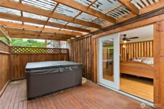 Hot tub and deck off the primary.