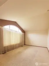 Formal living room with Designer window for lots of light and a vaulted ceiling