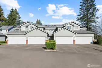 Updated Everett townhome with attached 2-car garage, 2 driveway spaces, and ample guest parking.