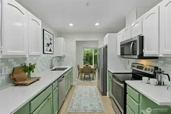 Functional kitchen with great prep space, open flow, and easy main-floor access.