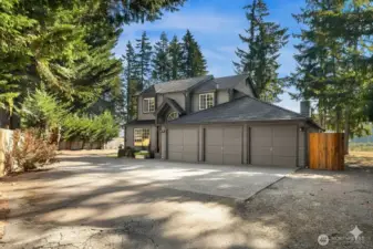 Charming home on peaceful 2.6-acre property with welcoming front entry.