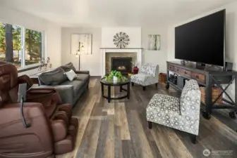 New gas fireplace with tile surround.