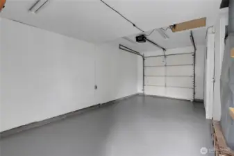 concrete fully grinded/primed and double coat of epoxy on the garage floor!