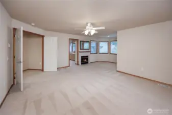 Primary suite w/gas fireplace seating area.