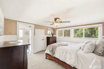 2 of 3 upper bedrooms. The door leads to an office or it could be a huge walk-in closet.