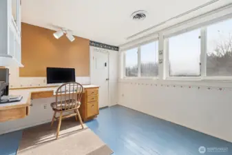 Used as an office, this room is off of one of the upper bedrooms. This could be a nursery or a walk-in closet.