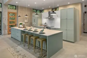 View of the kitchen and the huge island. This island is a great place for guest to gather.