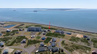 FROM THE NORTH VIEW OF THE HOME (ARROW) OUT TOWARD THE JETTY WITH SHIPS IN THE BACKGROUND!