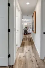 Upstairs hallway showcasing beautiful laminate flooring, combining style and durability for a polished look.