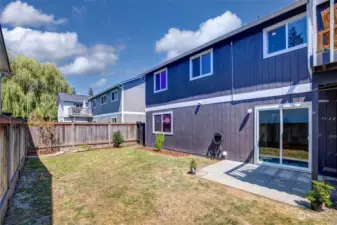 Fenced yard ideal for pets, gatherings, or transforming into your personal garden oasis.