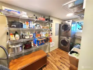 Spacious pantry with room for freezer and comes with the washer and dryer.