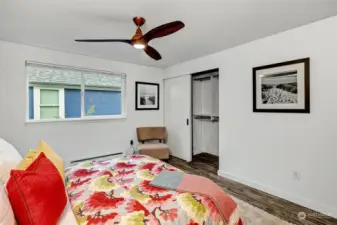 Second bedroom with custom California Closets and a ceiling fan for warm summer days.  There is also a portable A/C unit as well.