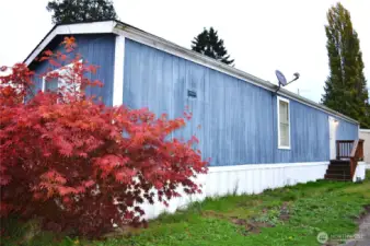 The front and south sides with the back porch.