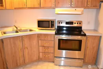 A stainless steel glass cooktop stove and microwave come with the property!