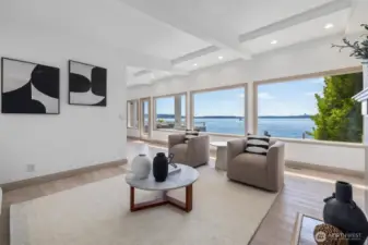 A wall of windows invites serenity and tranquility into every moment, offering breathtaking views from nearly every room.
