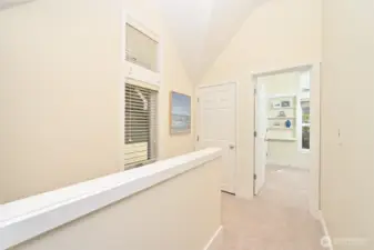 Upstairs offers vaulted ceilings and ample light making this home feel spacious and bright.