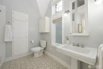 The upstairs main/full bathroom is quite big and so pretty and welcoming.