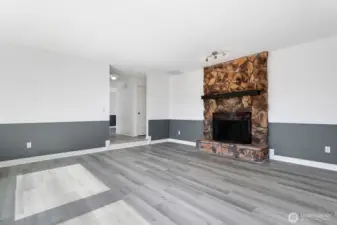 Inside you’ll be welcomed by a sunken formal living room