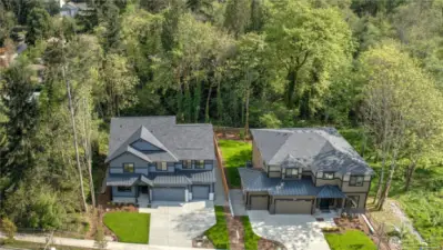 Showcasing the tranquility from the trees that surrounded this small enclave of custom home. Just beyond the natural fencing is designated area that surround the lots, which means you will always have privacy!
