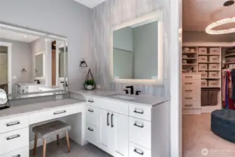 Two separate sink areas, this one with dressing area and bench.