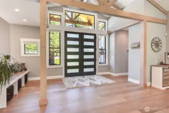 The front door. Engineered hardwood flooring used extensively.