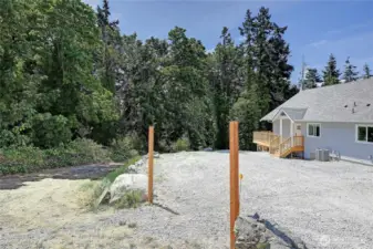 Two poles for private access to trail and road to beach
