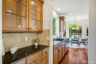 Butler's Pantry Features Under Cabinet Lighting & Extra Storage