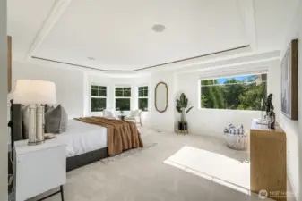 Generous Primary Suite, w/ Walls of Windows Looking Out Towards another Greenspace