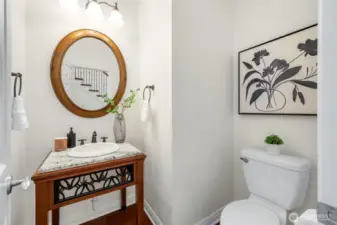 Main Floor Powder Bathroom Adjacent to the Laundry Room & Main Floor Den/Office