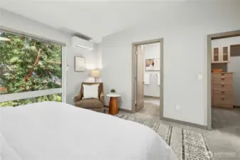 Another look at the primary suite in the back of the home. There are also custom blinds throughout - most are automatic with remotes.