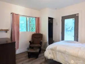 Bedroom on main floor. Exterior door to backyard.