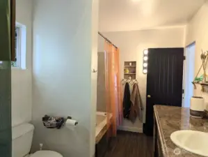 Large spacious bath with storage. W/D moved up from basement, could be additional bath built.