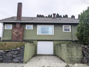 Great view of side of home & garage.