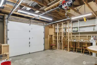 Garage door with electric opener and lift