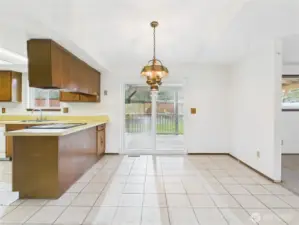 Kitchen with Room for Table and backyard access
