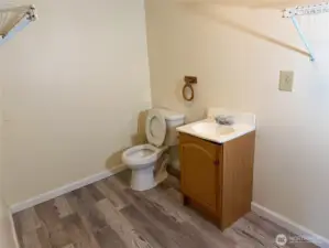 .50 Bathroom in laundry room.