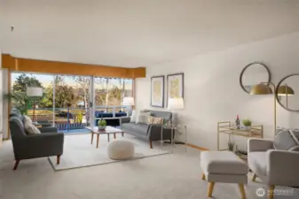 Spacious living room with fabulous light and partial lake views