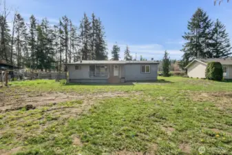 View of the rear of the home from near the creek