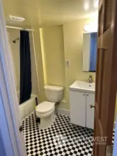 This is the updated bathroom in the downstairs apartment.