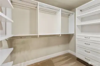 Bring all your clothes & shoes - there's plenty of room with dual walk-in closets featuring custom closet organizers