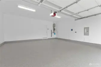 The garage features brand new epoxy flooring and was also freshly painted. The tankless water heater allows for endless hot water and the sprinkler system makes yard maintenance easy