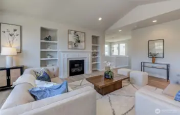 A look back toward the entrance stairs.. lovely fireplace for cozy days & nights