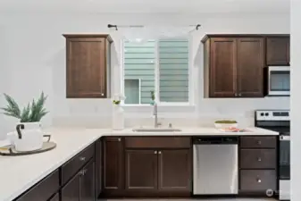 Tons of cabinets, there is even a pantry on the opposite side of the kitchen