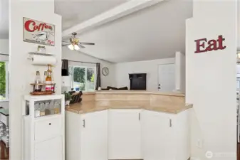Looking at the front door/living room from the kitchen