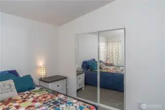 Closet in the bedroom and more in the bathroom area