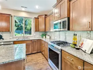 Stainless steel appliances, including this gas range, are efficient & easy to clean.