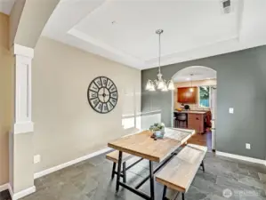 Coved ceilings and arched doorways set this home apart